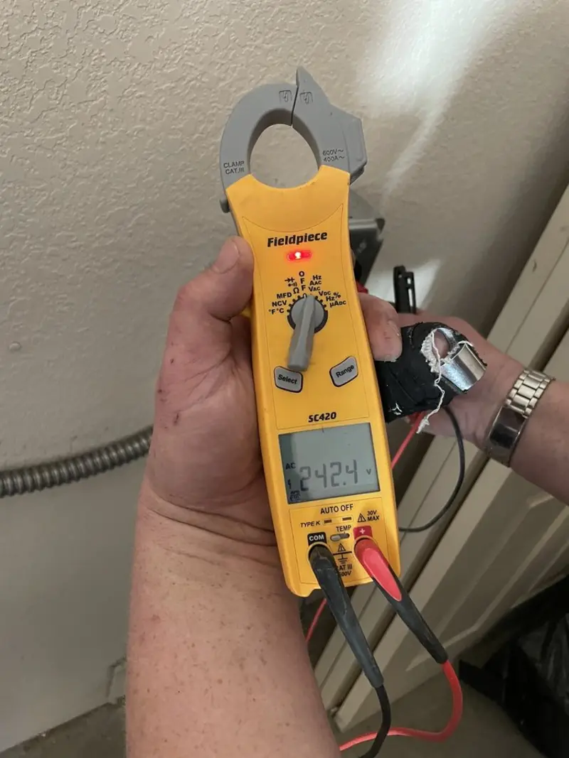 Voltage testing with clamp meter during Generator Installation in Haskell